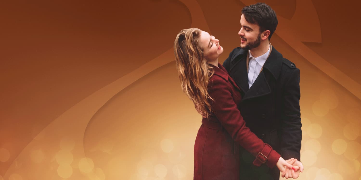 Young couple dancing in the Summer